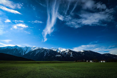 Scenic view of snowcapped mountains against sky