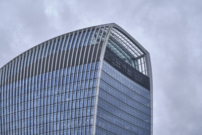Low angle view of skyscraper against sky