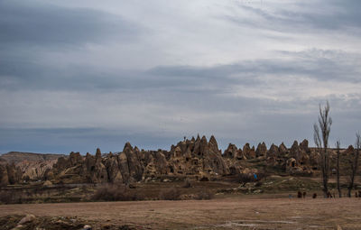 Scenic view of rock formation against sky