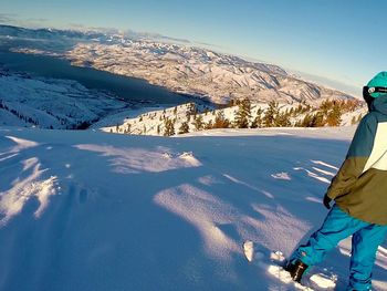 Scenic view of mountains against cloudy sky