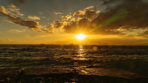 Scenic view of sea against sky during sunset