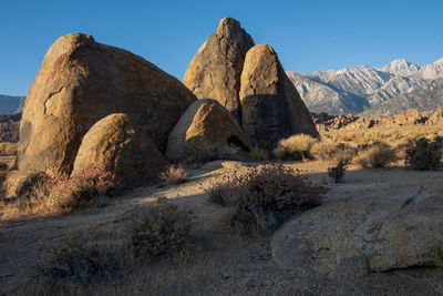 Scenic view of rocky mountains against clear sky