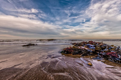 Scenic view of sea against sky at sunset