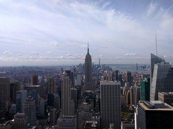 High angle shot of cityscape against sky