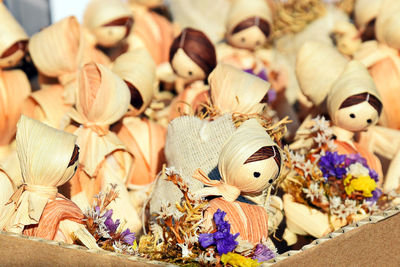 Straw souvenirs. wonderful little european dolls. close-up.