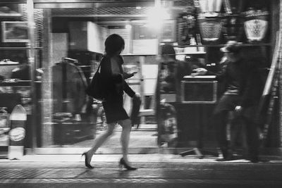 Woman standing in city