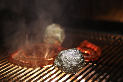 Close-up of meat on barbecue grill