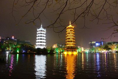 Illuminated ferris wheel at night
