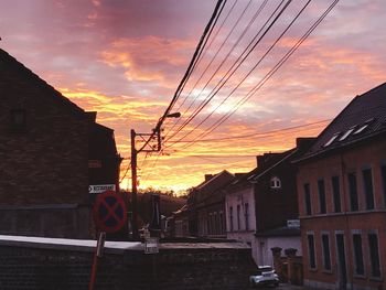 Buildings against sky during sunset