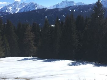 Scenic view of mountains against sky during winter