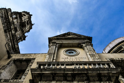 Low angle view of old building against sky