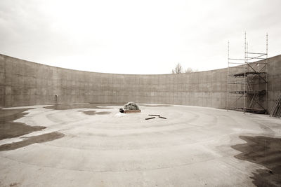 High angle view of skateboard on building against sky