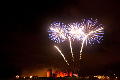 Low angle view of firework display