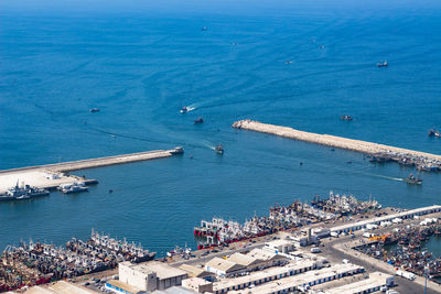 High angle view of harbor by sea