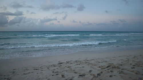 Scenic view of beach against sky