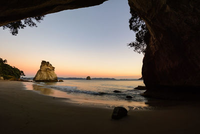 View of beach at sunset