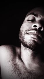 Close-up mid section of man looking away