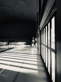 People walking on road amidst buildings in city