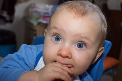 Portrait of cute baby at home