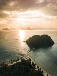 High angle view of sea against sky during sunset