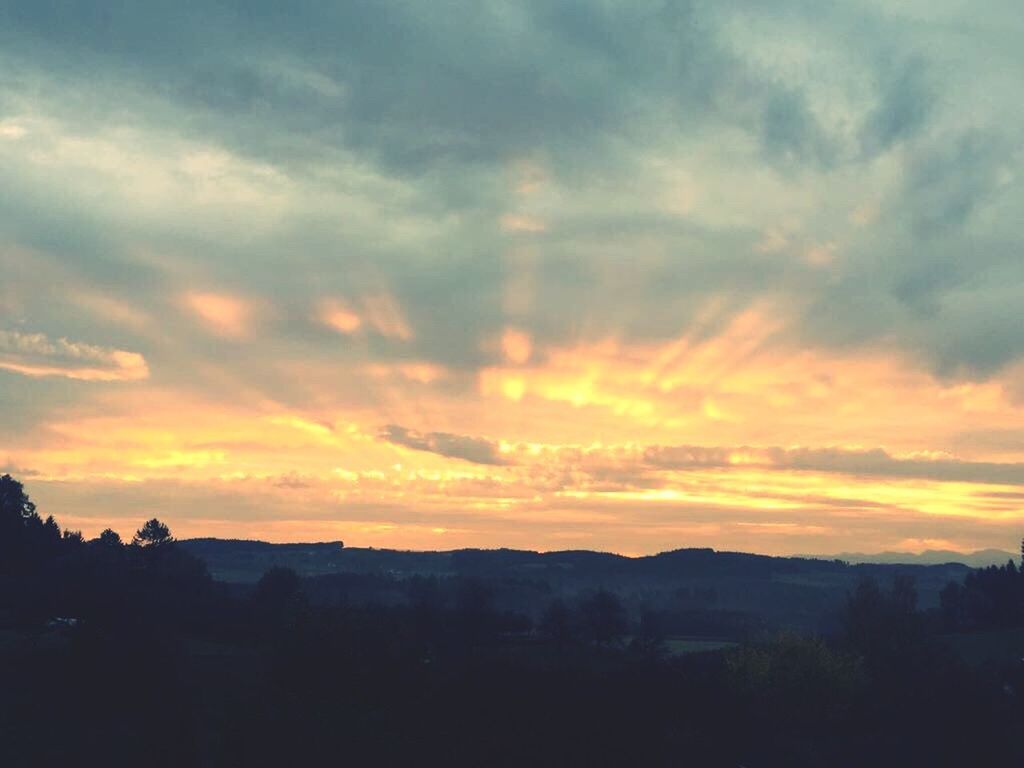 SILHOUETTE LANDSCAPE AGAINST SKY DURING SUNSET