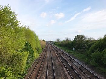 Railway tracks against sky