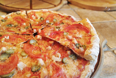 High angle view of pizza in plate on table