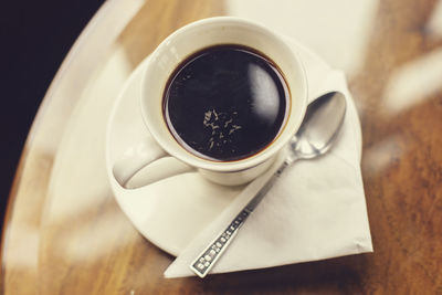 Close-up of coffee cup on table