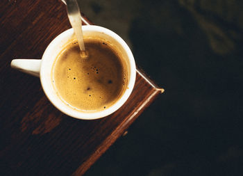 High angle view of coffee cup on table