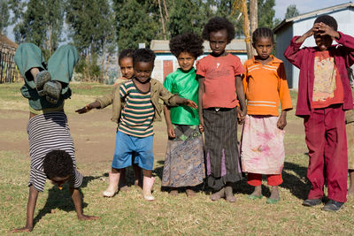 Portrait of people standing outdoors