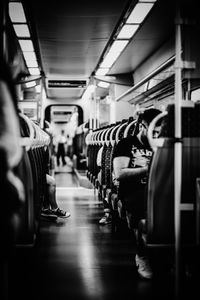 Long angle vieuw of a train interior in black and white
