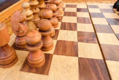 High angle view of chess pieces on table