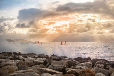 Scenic view of sea against sky during sunset