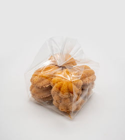 High angle view of bread on white background