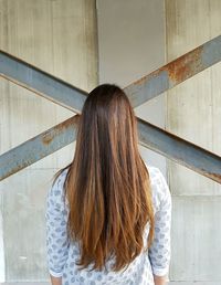 Rear view of woman looking up