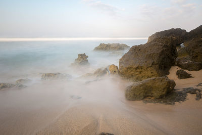 Scenic view of sea against sky during sunset