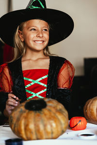 Portrait of smiling girl wearing hat