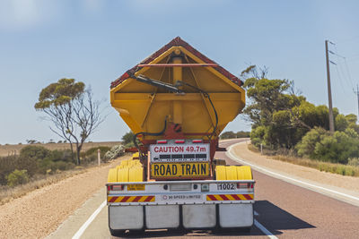 Australia, south australia, nullarbor plain, warning sign behind truck on eyre highway