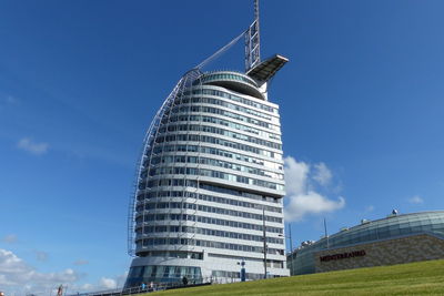 Low angle view of building against blue sky