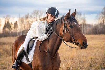 Horse standing on field