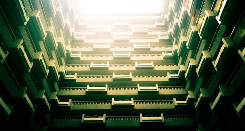 Low angle view of illuminated staircase in building