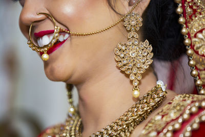 Close-up of bride wearing jewelry