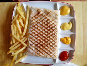 Close-up of breakfast served on table