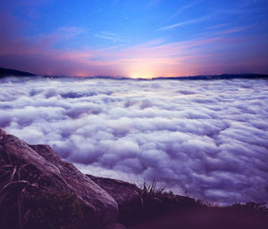 Scenic view of landscape against sky during sunset