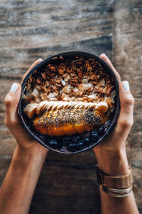 Midsection of person holding ice cream