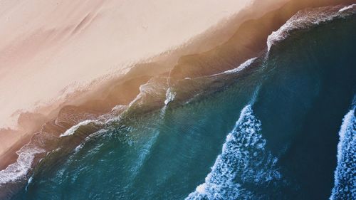 Sea waves splashing on shore