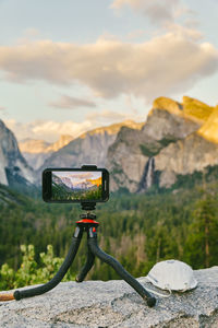 Phone taking picture of yosemite national park in northern california.