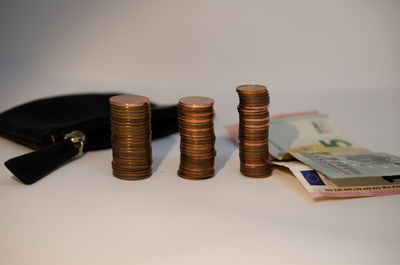 Close-up of coins on table