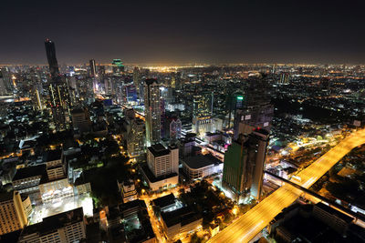 High angle view of illuminated city at night