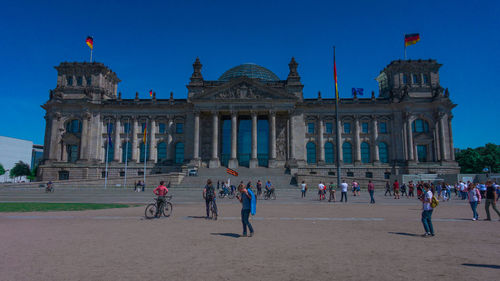 Group of people in front of building